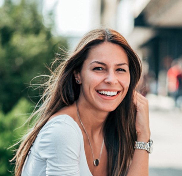 woman smiling outside 