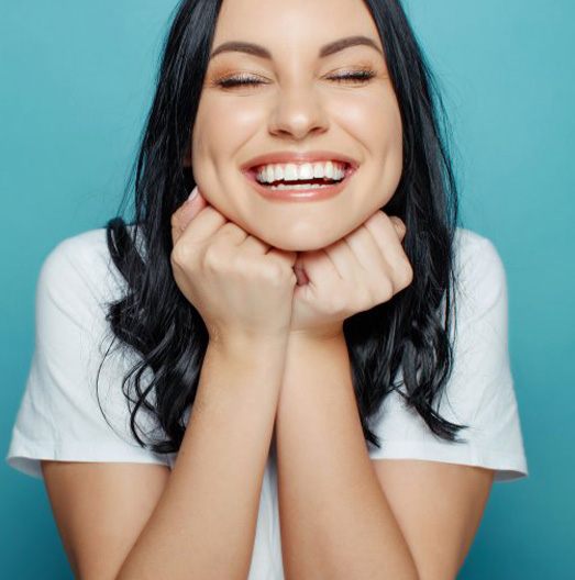Lady shows radiant smile
