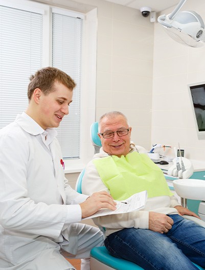 Man smiling at the dental office
