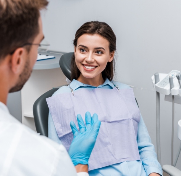 Young woman smiling in Northbrook dental office