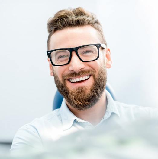 a patient smiling after undergoing direct bonding