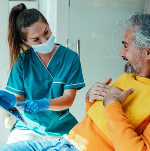 Patient talking to a dentist