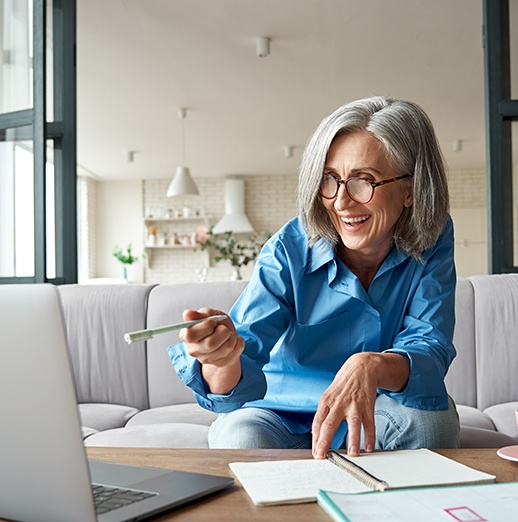 Patient in Northbrook budgeting for dentures