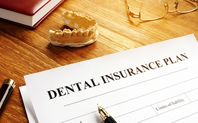 Patient in Northbrook looking at dental insurance for dentures