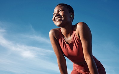 Lady smiles outdoors