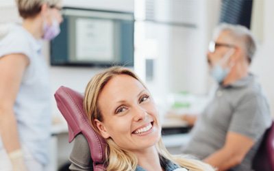 Woman smiling in the dental chair