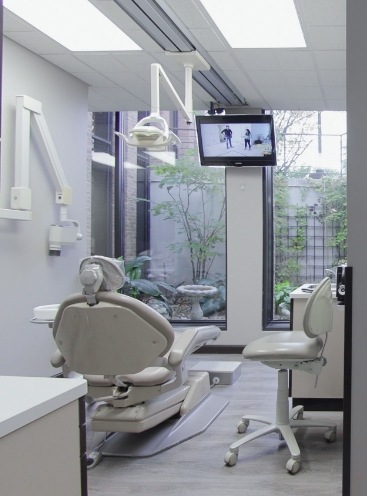 Dental treatment room with full sized windows
